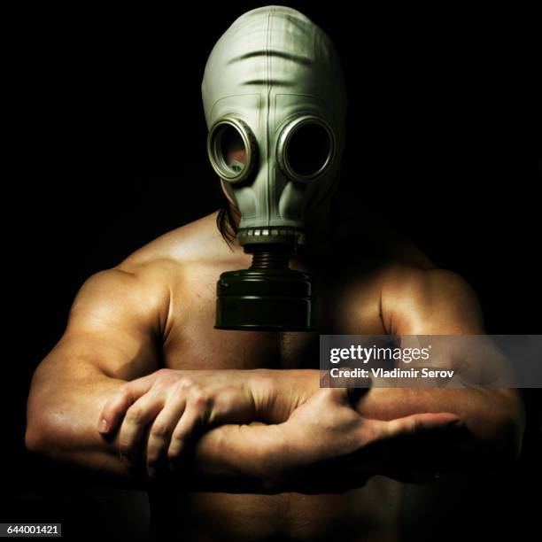 nude caucasian man wearing gas mask - air respirator mask stock pictures, royalty-free photos & images