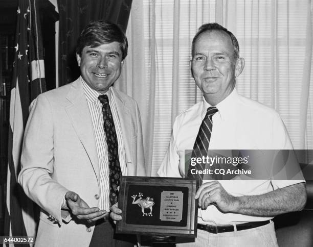 Rep. Cass Ballenger, R-N.C. With Richard H. Lehman. Presenting an award from the Congressional division of the Calaveras County Frog Jump...