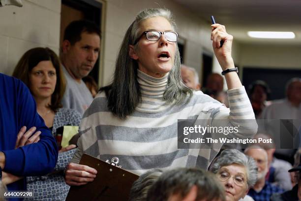 Iowa Falls, IA Edith Haenel of Northwood speaks out about education concerns to Senator Chuck Grassley during a town hall meeting in Garner, Iowa on...