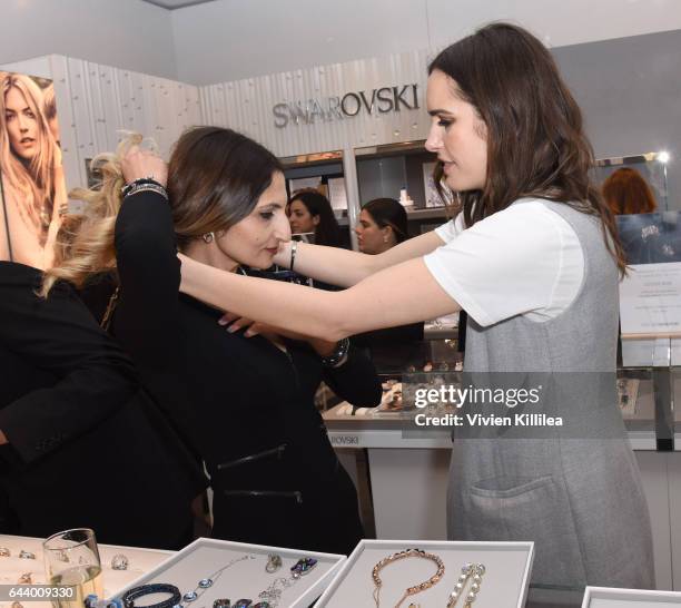 Louise Roe styles a guest at Atelier Swarovski and Louise Roe Celebrate Awards Season At the Grove on February 22, 2017 in Los Angeles, California.