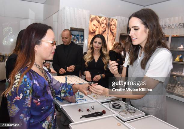 Louise Roe styles a guest at Atelier Swarovski and Louise Roe Celebrate Awards Season At the Grove on February 22, 2017 in Los Angeles, California.