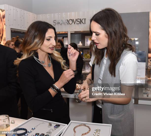 Louise Roe styles a guest at Atelier Swarovski and Louise Roe Celebrate Awards Season At the Grove on February 22, 2017 in Los Angeles, California.