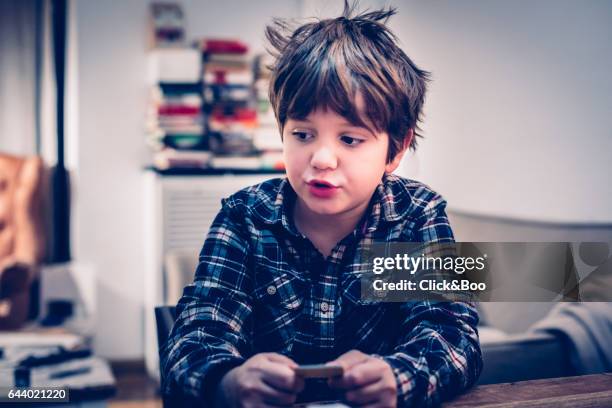 child playing cards - thinking of you card stock-fotos und bilder