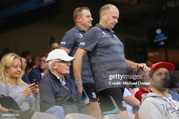 Power head coach Ken Hinkley walks to the quarter time huddle with assistant Michael Voss during the JLT Community Series AFL match between the St...