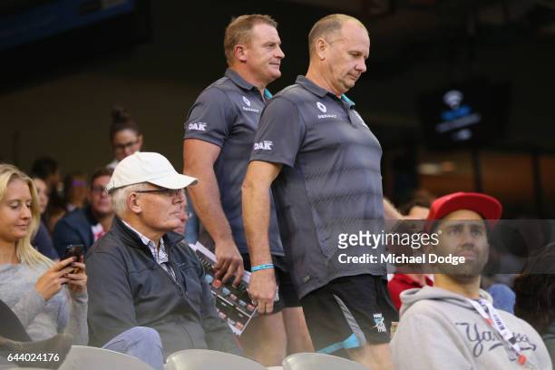 Power head coach Ken Hinkley walks to the quarter time huddle with assistant Michael Voss during the JLT Community Series AFL match between the St...