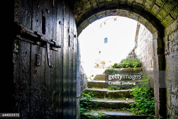 wood door in frederick tower - fortress gate and staircases stock pictures, royalty-free photos & images