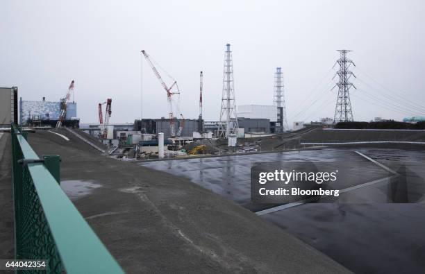 Reactor buildings, left to right, Unit 2, 3 and 4 stand at Tokyo Electric Power Co.'s Fukushima Dai-ichi nuclear power plant in Okuma, Fukushima,...