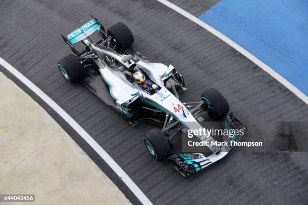 Lewis Hamilton of Great Britain and Mercedes GP drives during the launch of the Mercedes formula one team's 2017 car, the W08, at Silverstone Circuit...