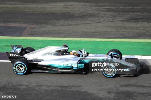 Lewis Hamilton of Great Britain and Mercedes GP drives during the launch of the Mercedes formula one team's 2017 car, the W08, at Silverstone Circuit...