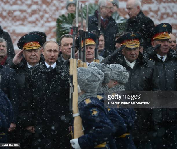 Russian President Vladimir Putin attends a wreath laying ceremony to the Tomb of Unknown Soldier, marking the Defender of the Fatherland Day on...