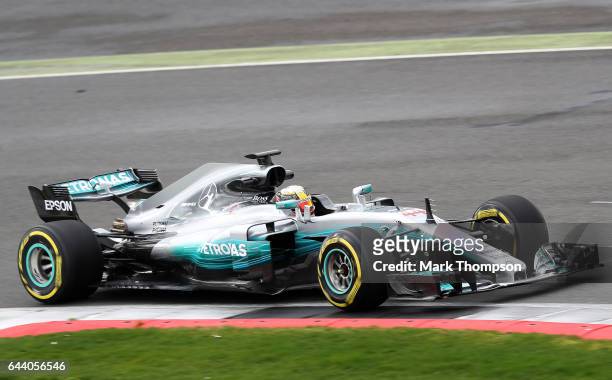 Lewis Hamilton of Great Britain and Mercedes GP drives during the launch of the Mercedes formula one team's 2017 car, the W08, at Silverstone Circuit...