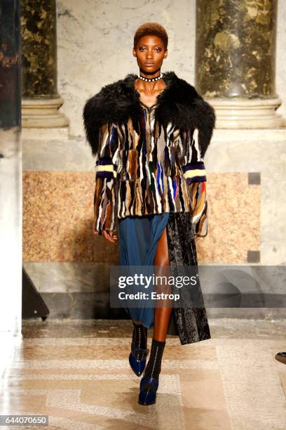 Model walks the runway at the Angelo Marani show during Milan Fashion Week Fall/Winter 2017/18 on February 22, 2017 in Milan, Italy.