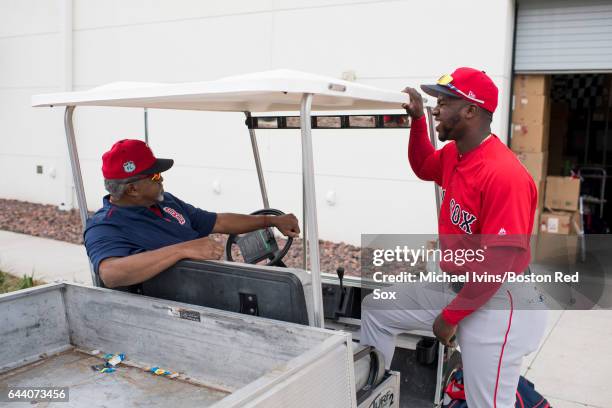 Rusney Castillo of the Boston Red Sox talks to Luis Tiant before spring training workouts on February 21, 2017 at jetBlue Park in Fort Myers, Florida.