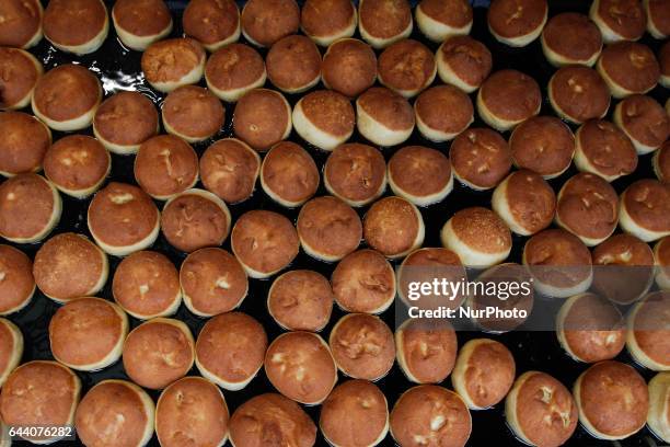 The last Thursday before Lent also known as Fat Thursday or Tlusty Czwartek people in Poland traditionally eat paczki, jam filled pastries similar to...