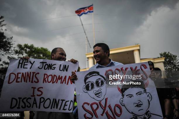 Protester holds a placard infront of North Korean Embassy in Kuala Lumpur on February 23, 2017