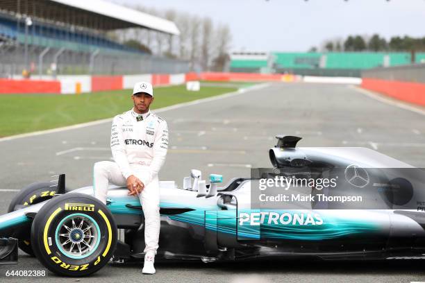 Lewis Hamilton of Great Britain and Mercedes GP poses during the launch of the Mercedes formula one team's 2017 car, the W08, at Silverstone Circuit...