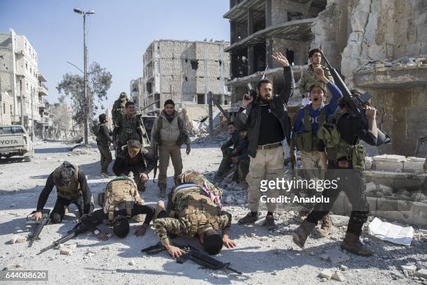 Members of Free Syrian Army celebrate in Syria's Al Bab, after taking control of the district's centrum from Daesh terrorists during the "Operation...