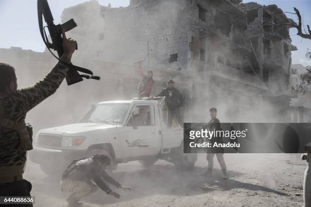 Members of Free Syrian Army celebrate in Syria's Al Bab, after taking control of the district's centrum from Daesh terrorists during the "Operation...