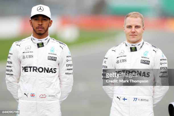 Lewis Hamilton of Great Britain and Mercedes GP and Valtteri Bottas of Finland and Mercedes GP pose during the launch of the Mercedes formula one...