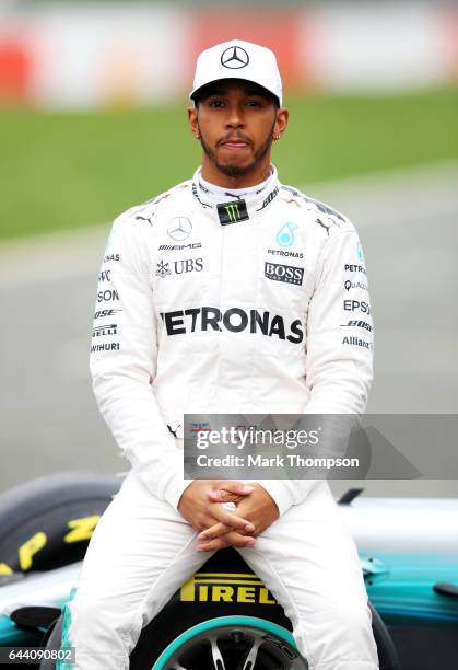 Lewis Hamilton of Great Britain and Mercedes GP poses during the launch of the Mercedes formula one team's 2017 car, the W08, at Silverstone Circuit...