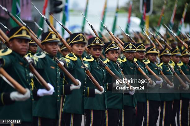South African Defence Force members parade at Moses Mabhida stadium during Armed Forces day on February 21, 2017 in Durban, South Africa. President...