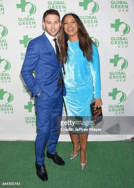 Actors Ryan Guzman and Garcelle Beauvais arrive at the 14th Annual Global Green Pre-Oscar Gala at TAO Hollywood on February 22, 2017 in Los Angeles,...