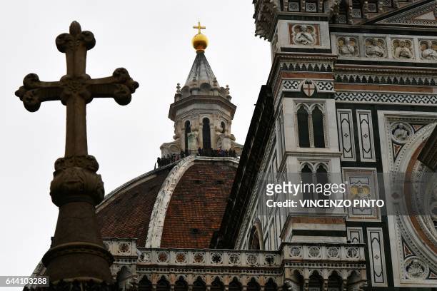 Picture taken on February 23, 2017 shows Santa Maria del Fiore cathedral , built by Italian architect Arnolfo di Cambio, and on the back ground the...