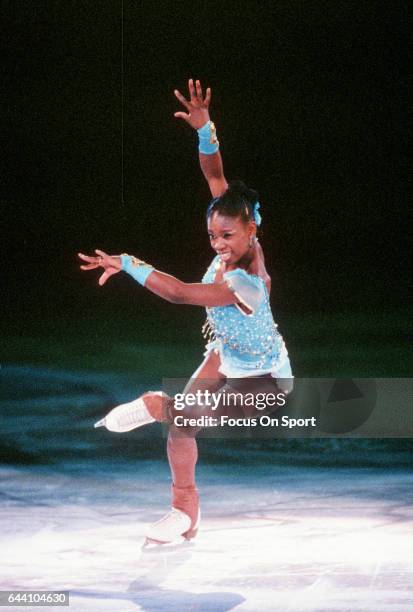 Figure Skater Surya Bonaly of France competes in a figure skating competition circa 1997.