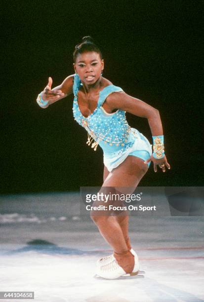 Figure Skater Surya Bonaly of France competes in a figure skating competition circa 1997.