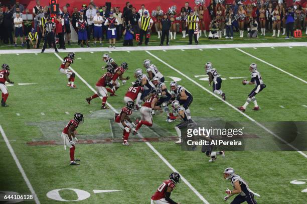 Quarterback Tom Brady of the New England Patriots in action on the Super Bowl LI Logo during the Super Bowl LI between the New England Patriots and...