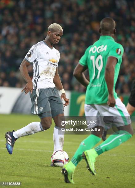 Paul Pogba of Manchester United and Florentin Pogba of Saint-Etienne in action during the UEFA Europa League Round of 32 second leg match between AS...