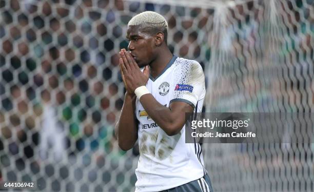 Paul Pogba of Manchester United reacts during the UEFA Europa League Round of 32 second leg match between AS Saint-Etienne and Manchester United at...