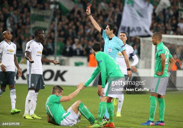 Eric Bailly of Manchester United is sent off with a red card by referee Deniz Aytekin of Germany during the UEFA Europa League Round of 32 second leg...