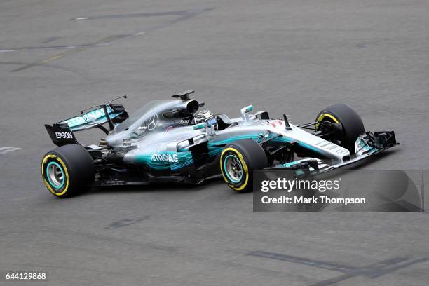 Valtteri Bottas of Finland and Mercedes GP drives during the launch of the Mercedes formula one team's 2017 car, the W08, at Silverstone Circuit on...