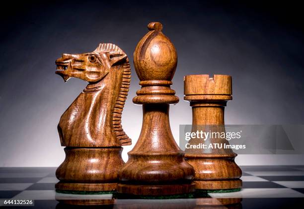 three chess men - chess pieces stock pictures, royalty-free photos & images