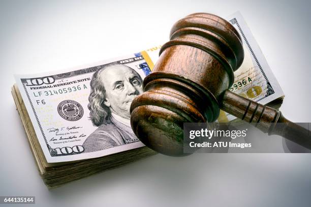 judge's gavel on money - judge gavel stock pictures, royalty-free photos & images