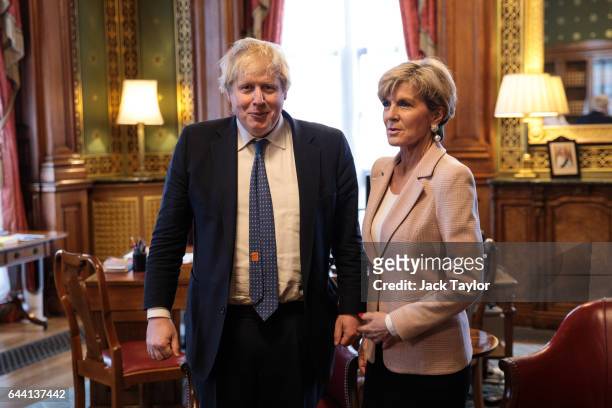 British Foreign Secretary Boris Johnson poses with his Australian counterpart Foreign Minister Julie Bishop in his office at the Foreign and...