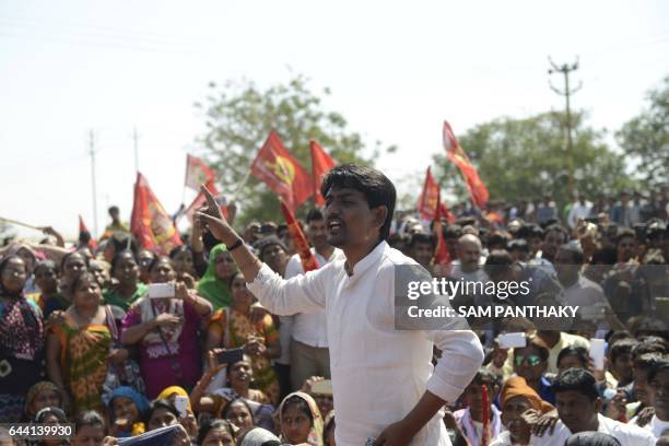 Indian Other Backward Class and Ekta Manch political organisation leader Alpesh Thakor speaks to supporters, as police block demonstrators from...