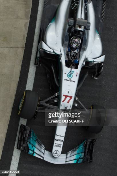 Mercedes AMG Petronas Formula One driver Finland's Valtteri Bottas drives during a launch event for the new 2017 season car at the Silverstone motor...