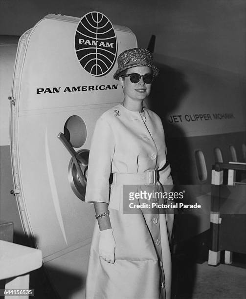 Princess Grace of Monaco, American former actress Grace Kelly standing by the Pan American World Airways Boeing 707-321 airliner, Clipper Mohawk,...