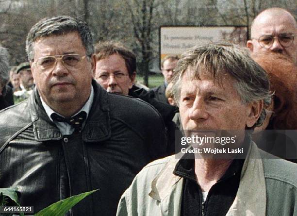 Polish film producer Lew Rywin and Polish-French film director Roman Polanski lay flowers at the Monument to the Ghetto Heroes in Warsaw, on April...