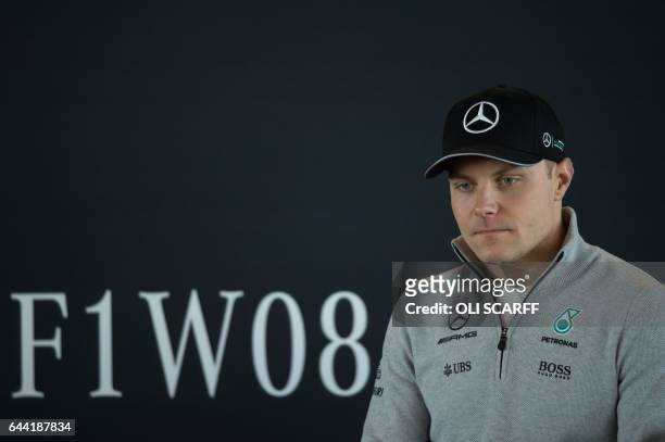 Mercedes AMG Petronas Formula One driver Finland's Valtteri Bottas speaks during a launch event for the Mercedes 2017 Formula one car at Silverstone...