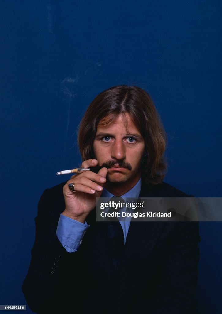 does ringo starr smoke cigarettes artificial BEATLES POSTER 1965 SMOKING CIGARETTE Home & Kitchen Drummer/Singer/Songwriter Ringo Starr lits a