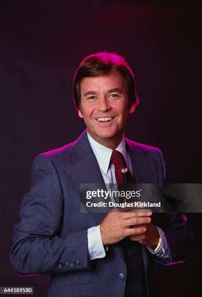 Dick Clark with a Microphone