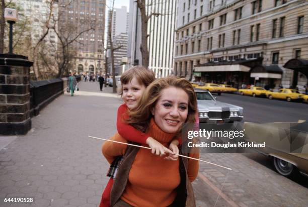 Barbara Walters Carrying Daughter