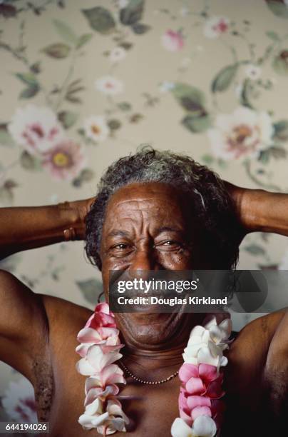 Photographer Gordon Parks in a Lei