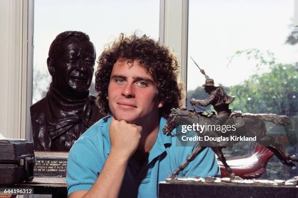 Actor Ethan Wayne, son of film legend John Wayne, sits among memorabilia of his father.