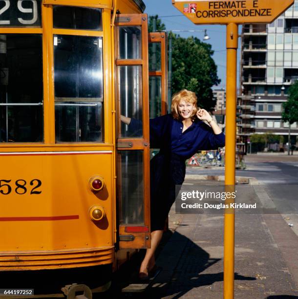 Portrait of actress Kathleen Turner on a bus while she was on location filming the 1988 film Julia and Julia.