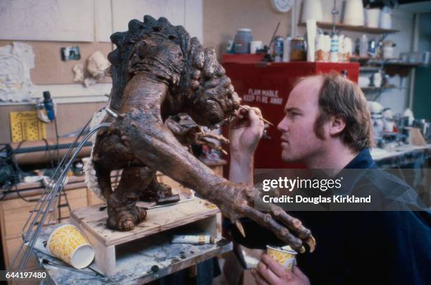 Model maker for Industrial Light and Magic puts the finishing touches on the Rancor, one of the fierce creatures Luke Skywalker must battle in the...