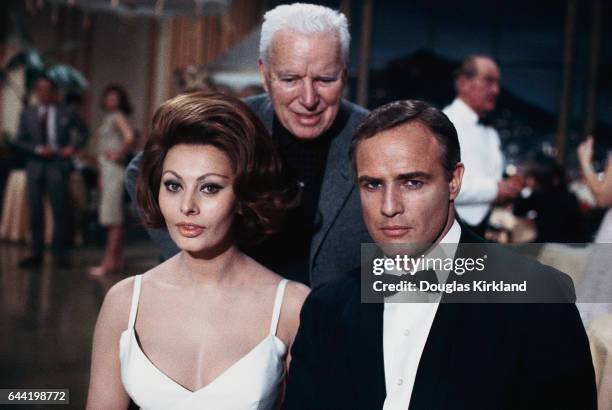 Charlie Chaplin directs Sophia Loren and Marlon Brando on the set of his last movie A Countess from Hong Kong. Movied released: 1967.